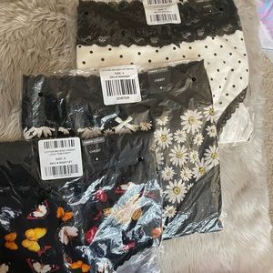 Torrid mid rise cheeky panty. Set of 3. Butterfly, Daisy and black polka. NWT